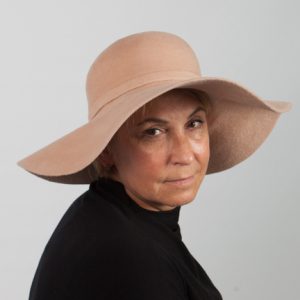 Beige large brimmed peach bloom felt hat with felt band