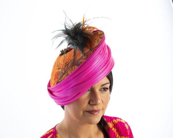 Front view pink and orange cocktail hat