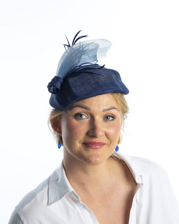 Front view of navy and light view of cocktail hat