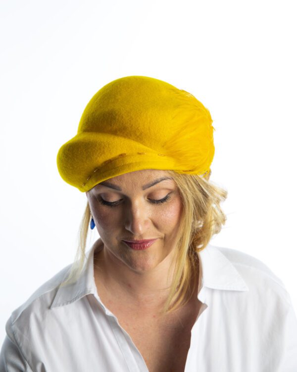 Top of bright yellow wool felt hat